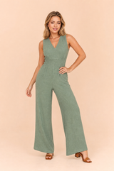 Grön V-ringad smockad overall