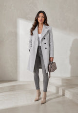 Manteau long ceinturé à col tailleur