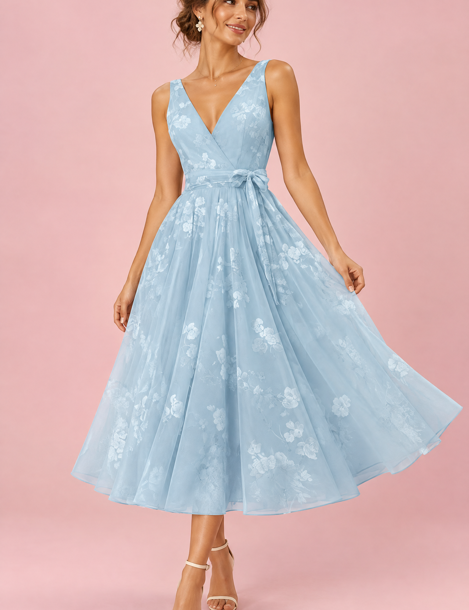 Robe midi fleurie bleu ciel à la coupe patineuse | Vue de face | Lounelle Paris