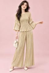 Plisserat set med vida byxor i beige