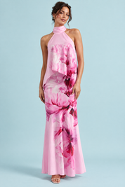 Jupe longue asymétrique rose à imprimé floral en satin mat | Vue de face | Lounelle Paris