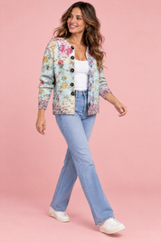 Cardigan fleuri boutonné bleu | Vue en mouvement | Lounelle Paris