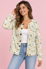 Blommig kofta med knappar i offwhite