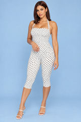 Vit figurnära jumpsuit med prickar