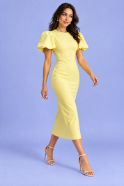 Robe midi jaune à manches bouffantes | Vue en mouvement | Lounelle Paris