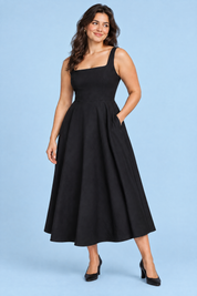 Robe midi noire à fines bretelles et ourlet ample | Porté sur une autre silhouette | Lounelle Paris