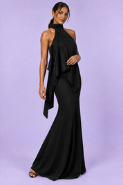 Jupe longue asymétrique noire à imprimé floral en satin mat | Vue de dos | Lounelle Paris