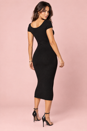 Robe midi noire à encolure découpée, épaules dénudées et manches courtes | Vue de dos | Lounelle Paris