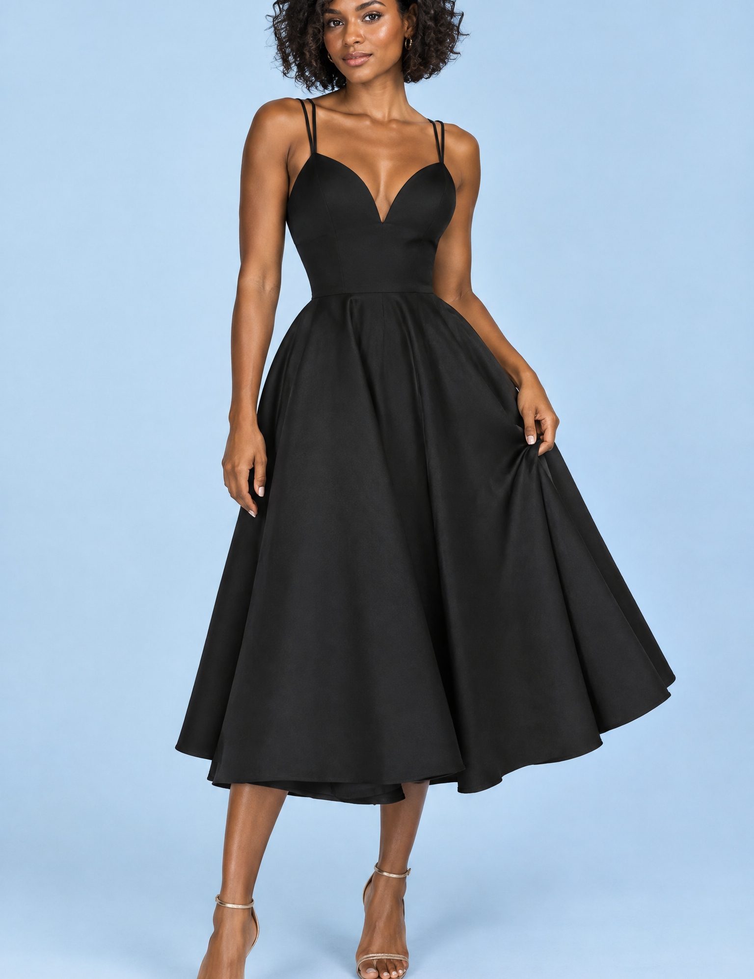 Robe midi noire à fines bretelles et jupe ample | Vue de face | Lounelle Paris