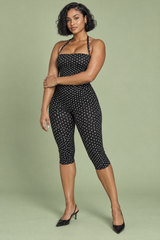 Svart figurnära jumpsuit med prickar