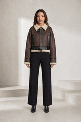 Veste courte effet moutonné à ceinture